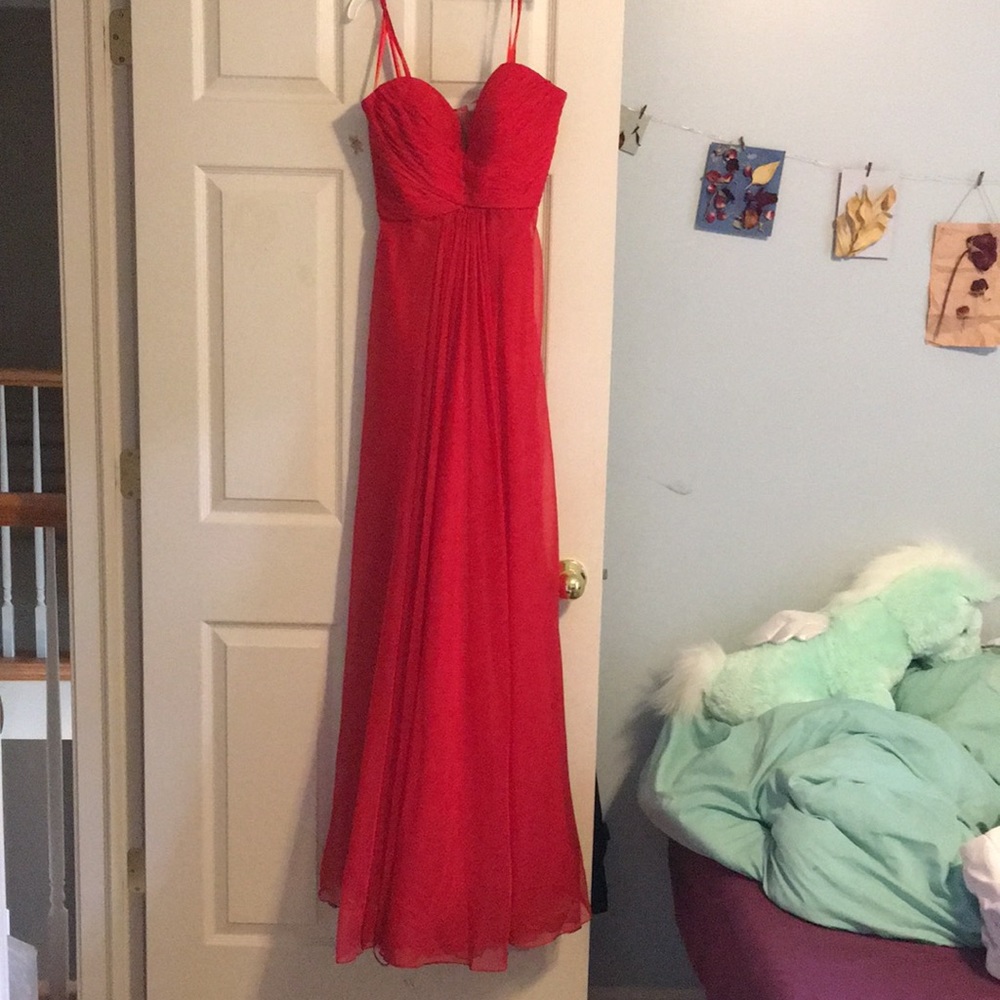 La femme red dress or gown